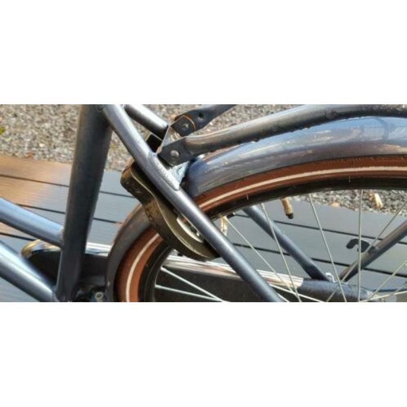 Evoque elite damesfiets. Stuurslot en vervoersrek.