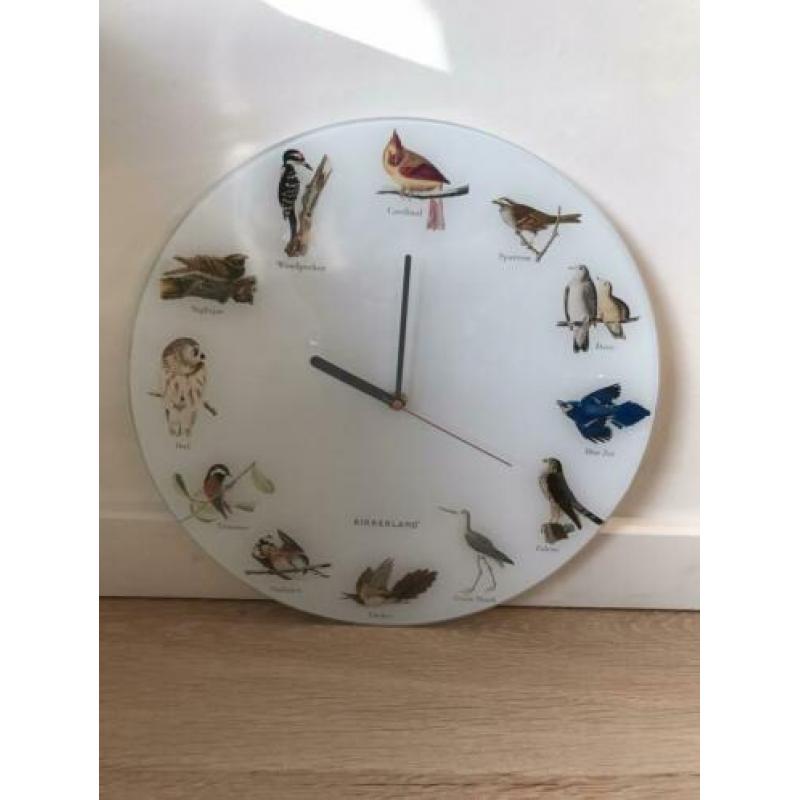 Wandklok met vogelgeluiden