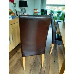 6 leren eetkamerstoelen met eikenhouten poten