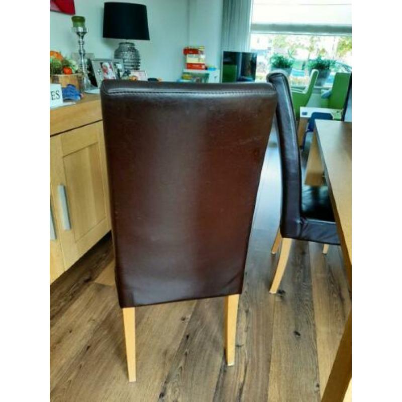 6 leren eetkamerstoelen met eikenhouten poten