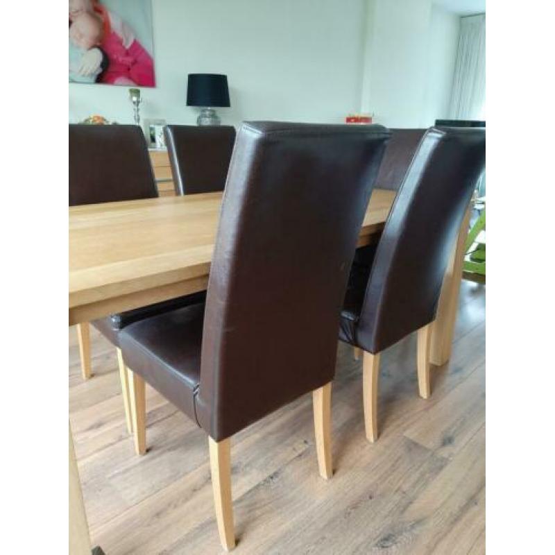 6 leren eetkamerstoelen met eikenhouten poten