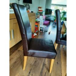 6 leren eetkamerstoelen met eikenhouten poten