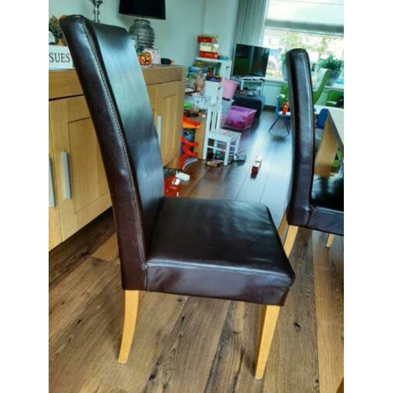 6 leren eetkamerstoelen met eikenhouten poten