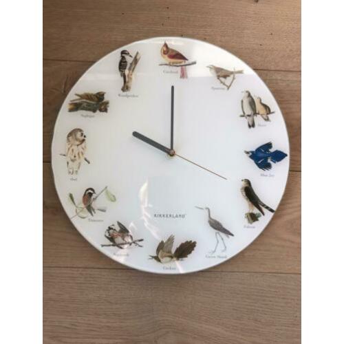Wandklok met vogelgeluiden