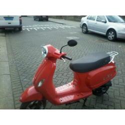 vespa look 2011 geel kenteken