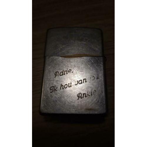 Zippo met tekst, zie foto's