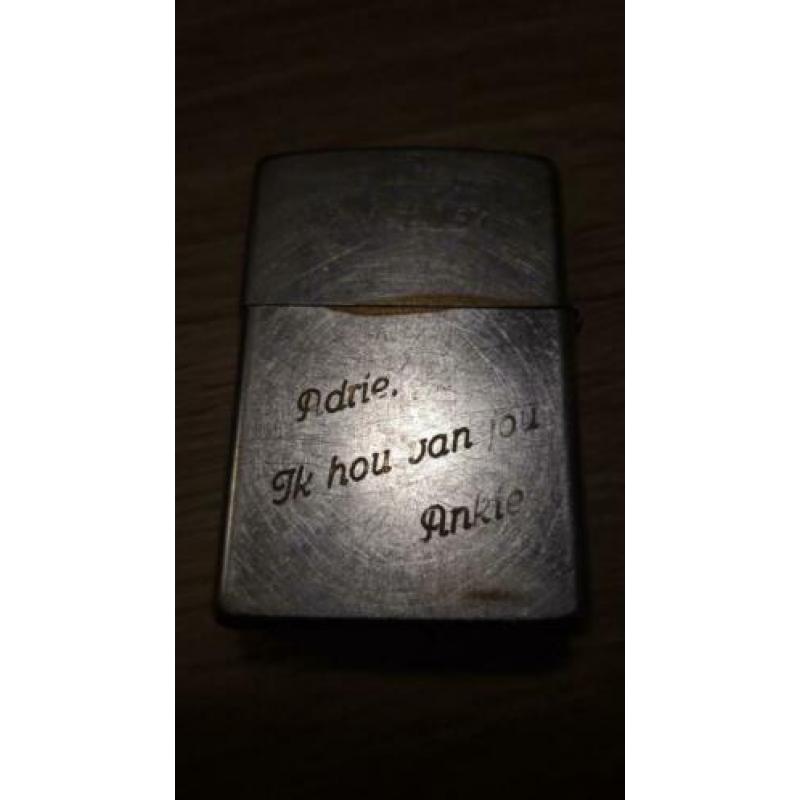 Zippo met tekst, zie foto's