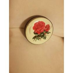 Mooi blik met rozen en hout motief