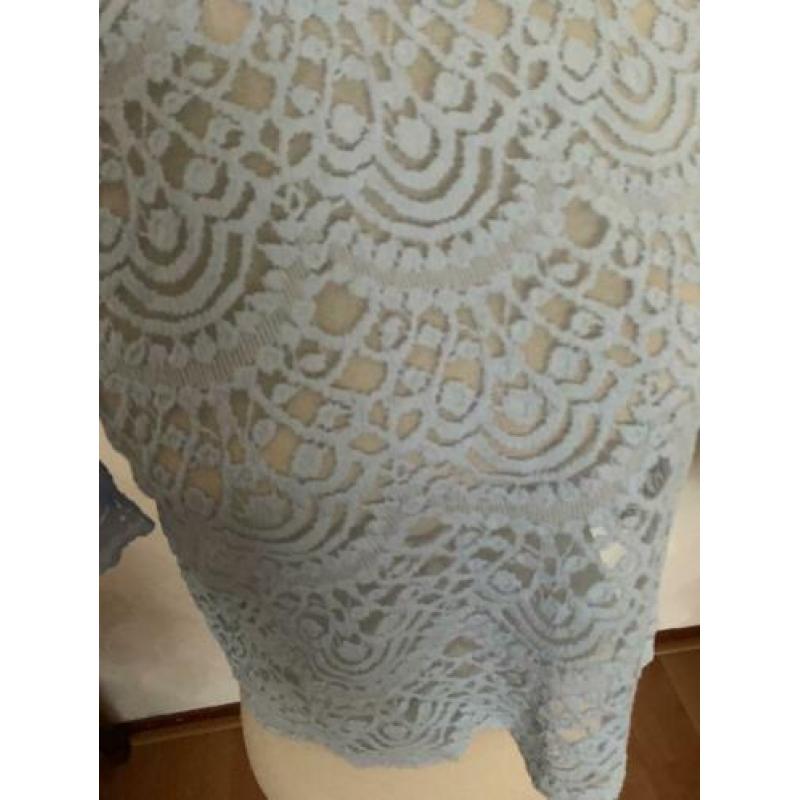 Lichtblauwe kanten blouse maat 42