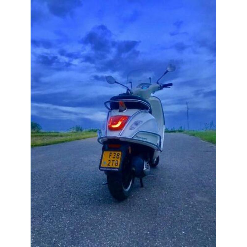 Vespa sprint / primavera.