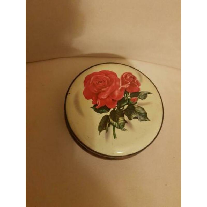 Mooi blik met rozen en hout motief