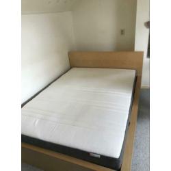 Ikea Malm bed (140x200cm) met 2 Sultan Lödingen lattenbodems