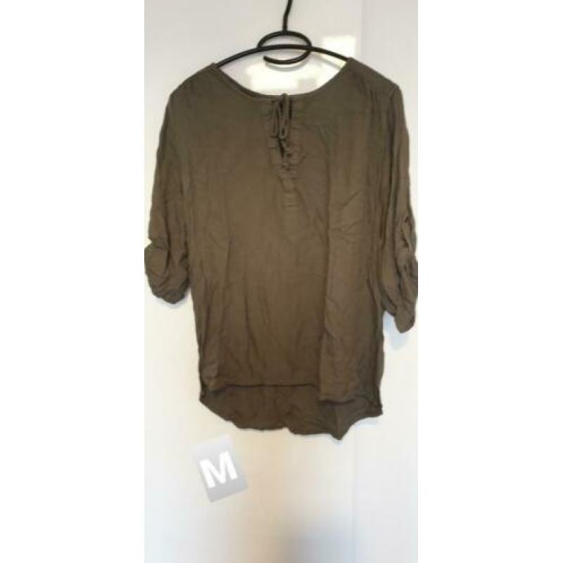 Veel blouses verschillende maten
