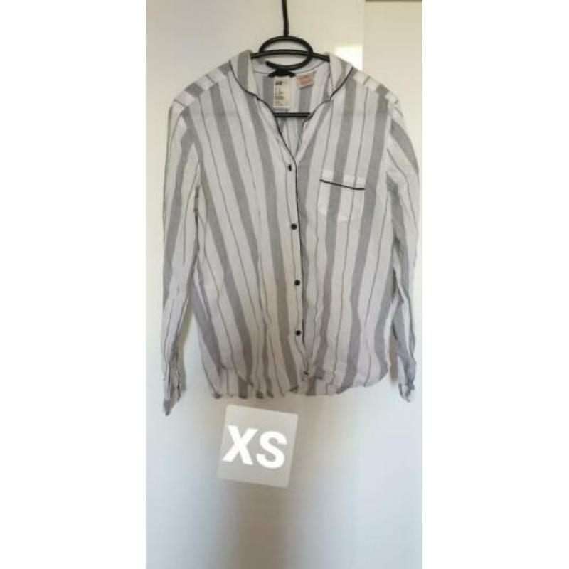 Veel blouses verschillende maten
