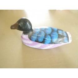 Zeven houten eendjes, decoratie