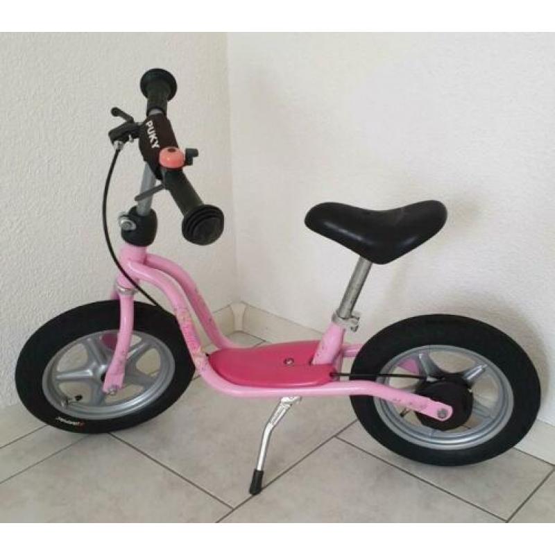 Puky roze loopfiets handrem luchtbanden standaard (zgan)