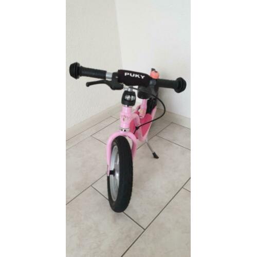 Puky roze loopfiets handrem luchtbanden standaard (zgan)