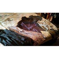 Te koop een pakket zeer weinig gedragen kleding. Maat s/xs
