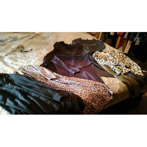 Te koop een pakket zeer weinig gedragen kleding. Maat s/xs