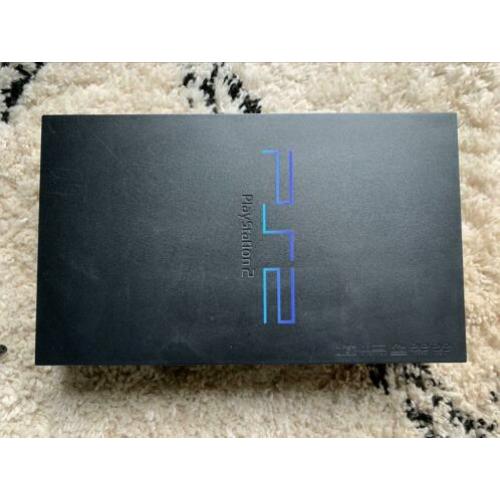 Playstation 2 met 2 controllers en 7 games