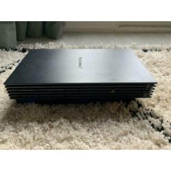 Playstation 2 met 2 controllers en 7 games