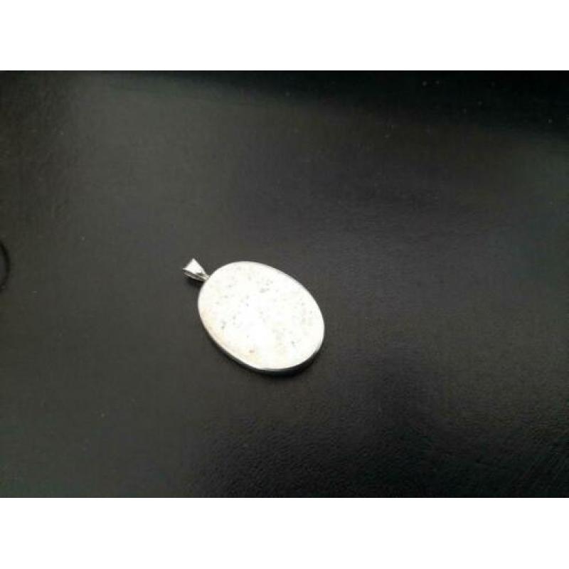 zilveren ringen en ketting hanger zie foto's