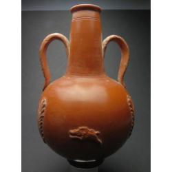 Roman Carthago sigilata bottle with boar and grain decoratio