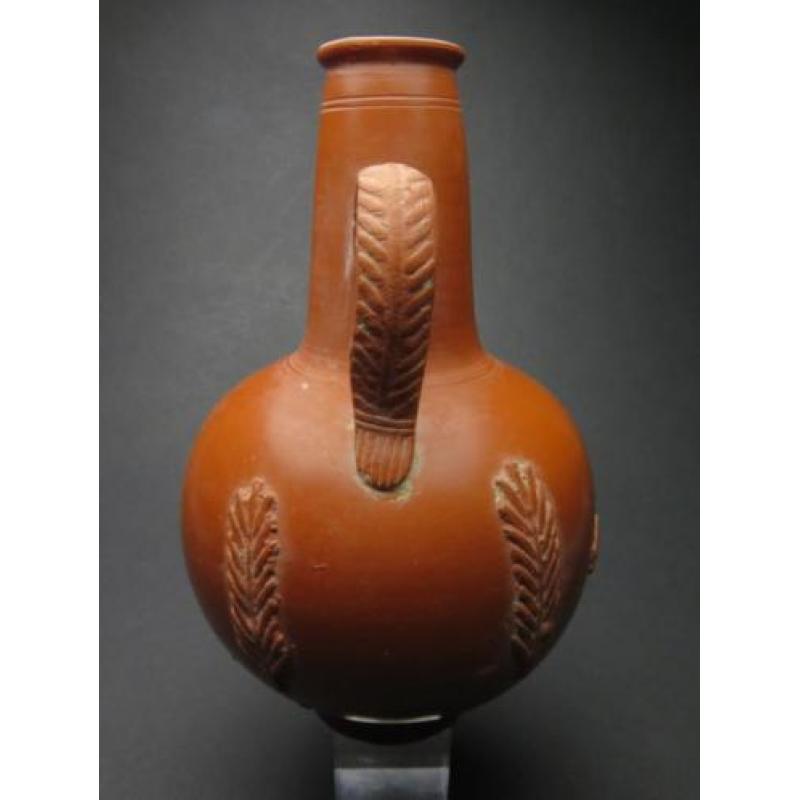 Roman Carthago sigilata bottle with boar and grain decoratio