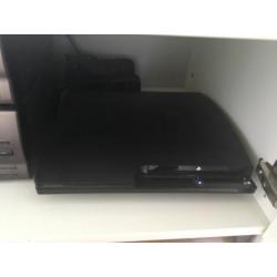 Ps3 320gb + 2 controllers (met sleeves) + 16 spellen