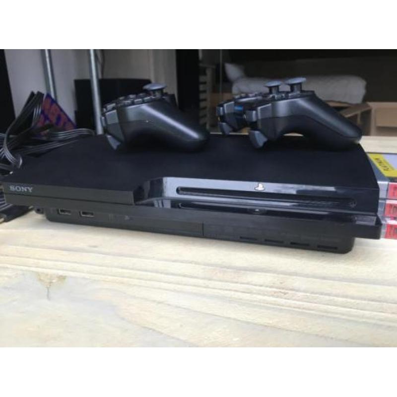playstation 3 met 2 controllers en 3 spellen