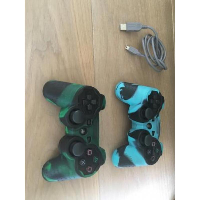 Ps3 320gb + 2 controllers (met sleeves) + 16 spellen